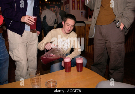 Students at Aberystwyth University drinking jugs of lager at a club in the town