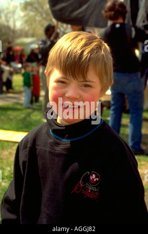 Boy age 9 at In the Heart of the Beast May Day Festival and Parade. Minneapolis Minnesota USA Stock Photo
