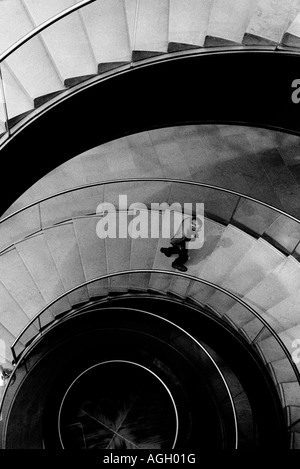 Man climbing stairs Stock Photo