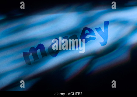 Money on blue background Stock Photo