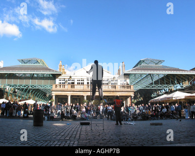 street performer in silhouette Covent Garden London England Stock Photo