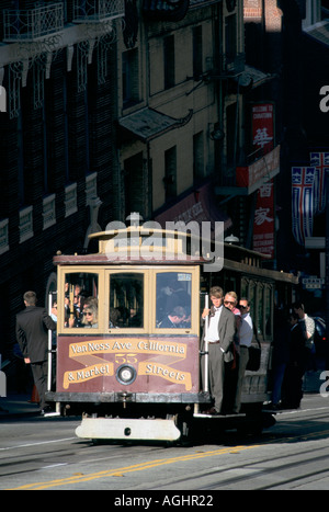 San Francisco, CA, USA, Chinatown, cable car climbs California Street near Grant Avenue, late afternoon Stock Photo