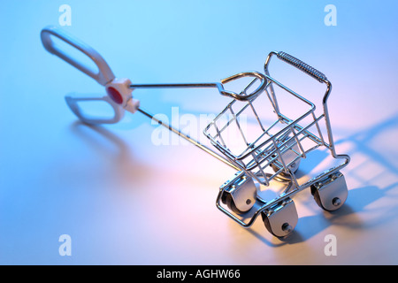 Kitchen Tongs with Miniature Trolley Stock Photo