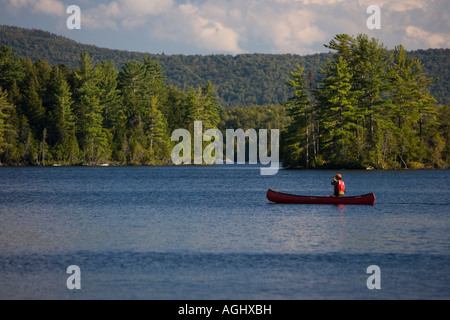 Canoeing on Prong Pond near Moosehead Lake in Maine. Owned 