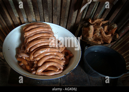 An extreme wide angle shot of Northern Thai sausage preparation Stock Photo