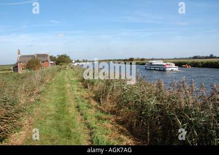 Broads cruiser on the River Bure near Acle, Norfolk, Broads National Park Stock Photo