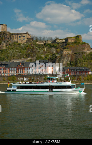 Koblenz; Pleasure boat on the Rhine River with Ehrenbreitstein fortress in background. Stock Photo