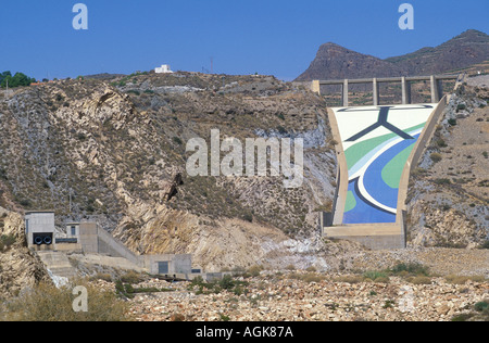 Indalo man painted on dam at dry reservoir Almeria Stock Photo