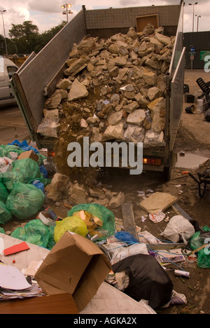 Lorry emptying its load of domestic building waste at Space Waye Recycling & Re-  use Centre, Feltham, Middlesex, UK. Stock Photo