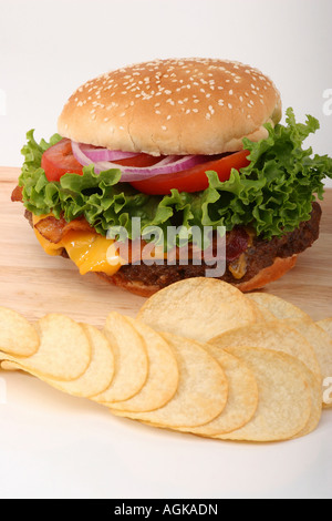 The Hamburger with potato chips Beef Burger American fresh fast food  pictures images photos very high resolution vertical format in USA US hi-res Stock Photo