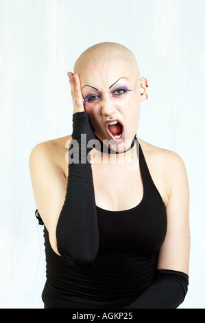 shaven head bald girl gothic screaming Stock Photo