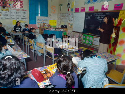 Kuwait Kuwait City Teacher & Children In English Language Class Stock Photo