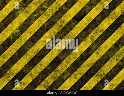 old grungy yellow hazard stripes on black road Stock Photo