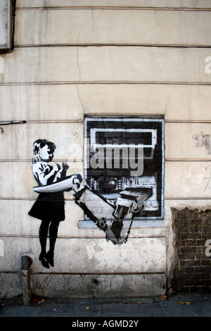 Banksy graffiti. London, England Stock Photo