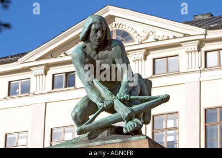 Statue of a man with crossbow in Gamla Stan Stockholm Old Town Stockholm Sweden Stock Photo