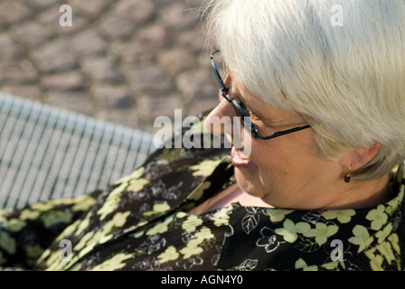 elderly woman in dark glasses Stock Photo
