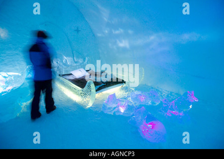 A person in a room in the Ice hotel Jukkasjarvi Sweden Stock Photo