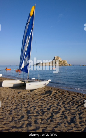 dh Kastri Island KASTRI ISLAND GREECE KOS Catamaran boat on beach Monastery of Ayios Antonis Kamari Bay Stock Photo