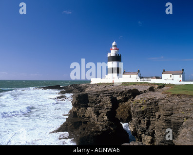 Old 19th nineteenth century Hook Head Lighthouse on cliffs seen from the east. Hook Head, County Wexford, Eire, Southern Ireland Stock Photo
