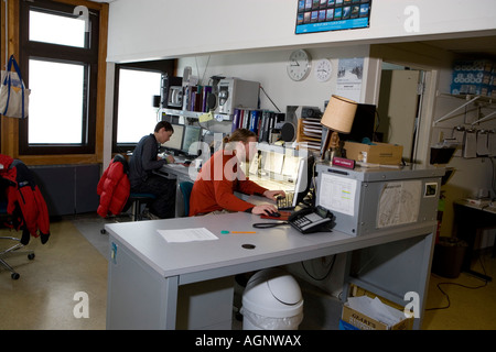 Meteorologists at work inside the Mount Washington Observatory Stock Photo