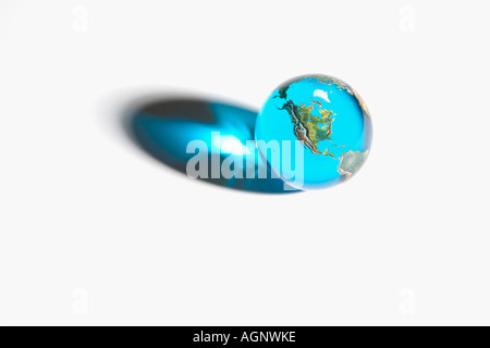 Glass earth globe on a white background emphasis on North America Stock Photo