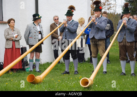 Men playing Alpenhorn / Penzberg Stock Photo