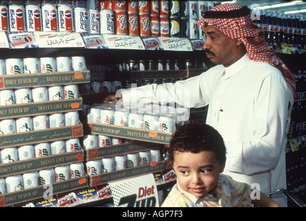 Man in Saudi Arabia buying groceries at American style supermarket Stock Photo