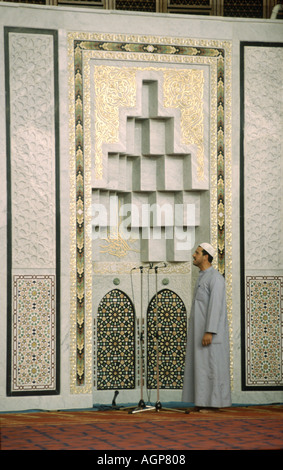Jordanian man praying at King Abdullah mosque in Amman Stock Photo