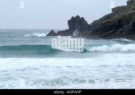 Porthcurnow beach Cornwall England UK Stormy sea and waves Stock Photo