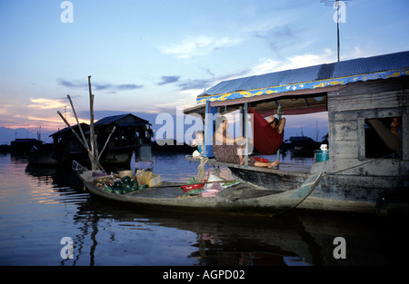 floating village on Tonle Sap Lake in the evening Stock Photo