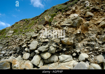 Porth Nanven beach Cot Valley Nr St Just Cornwall England with raised beach deposits overlaid by glacial scree in cliff Stock Photo