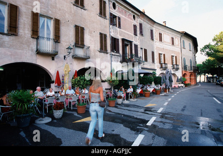 People in pavement cafe / Morcote Stock Photo