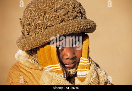 Algeria Tamanrasset People of Tuareg tribe Men riding camel while Stock ...