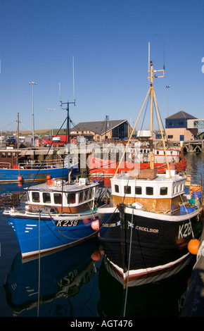 dh Harbour STROMNESS ORKNEY Fishing boats berth at quayside quay Stock Photo