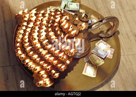 HMA79966 Oil Lamps on special prayer being offered by Jain religious community in India Stock Photo