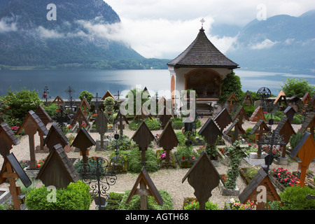 Small cemetery overlooking the Hallstatt lake and surrounding mountains. Hallstatt village, Salzkammergut, Austria. Stock Photo