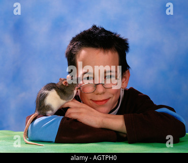 Boy with Domestic Rat Stock Photo