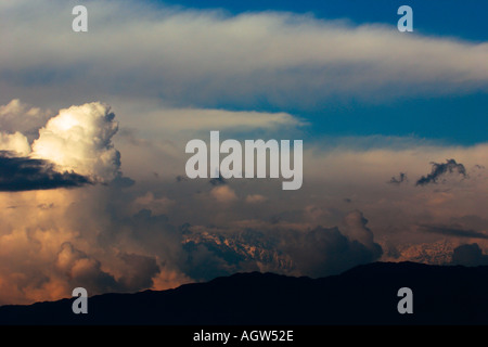 Monsoon clouds growing over mountains in the kathmandu valley Stock Photo