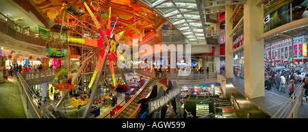 Interior of Toys R Us store and ferris wheel Times Square New York City Stock Photo