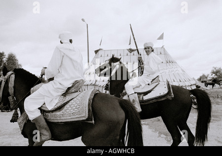 Noble Berber horsemen in Marrakech Marrakesh in Morocco in the Maghreb in North Africa Sahara. People Horse Activity Culture Moorish Reportage Travel Stock Photo