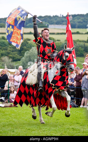 Winning knight celebrates at jousting tournament Stock Photo