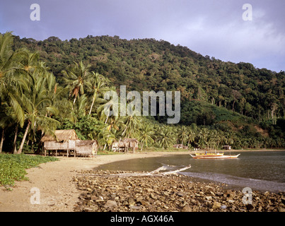 Philippines Palawan Boayan Island fishermens dwellings on beach Stock Photo