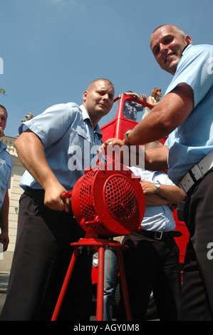 Two fire fireman officers on protest of polish uniformed services in Warsaw against bad working conditions and low pay Stock Photo