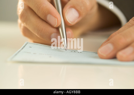 Man writing out a check