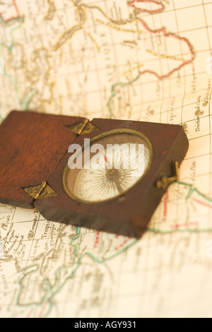 old world map with charting tools, compass, and beer bottle Stock Photo ...