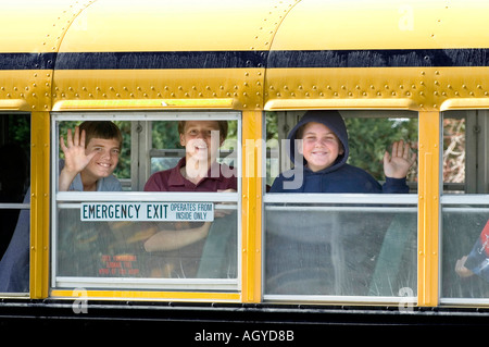 Amish life in Millersburg and Sugar Creek Holms County Ohio School children boarding a school bus Stock Photo