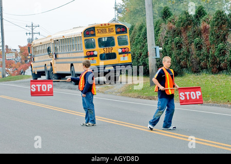 Amish life in Millersburg and Sugar Creek Holms County Ohio School crossing guards with flags to stop traffic Stock Photo