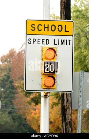 School speed limit sign with flashing light Stock Photo: 2992097 - Alamy