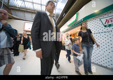 Commuters hurrying across concourse at Waterloo Station London Stock Photo