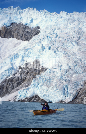 kayaker photographing at Northwestern Fjord Kenai Fjords National Park southcentral Alaska Stock Photo
